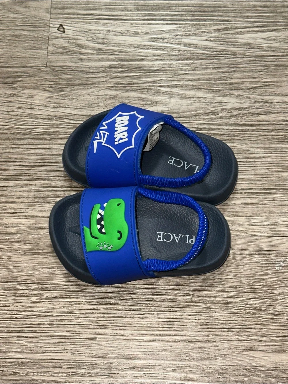 The Children's Place Blue Slide Sandals with Green Dinosaur and 'ROAR'